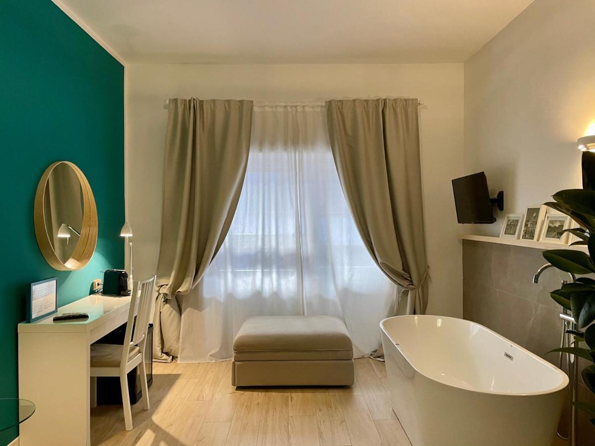 Le Coq Suites Рим Экстерьер фото